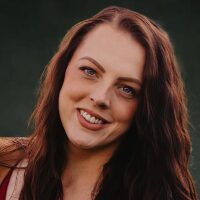 Portrait of a smiling woman outside